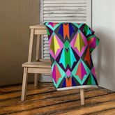 Mystic Serenity Art Nouveau Bath Towel on a bathroom rack.